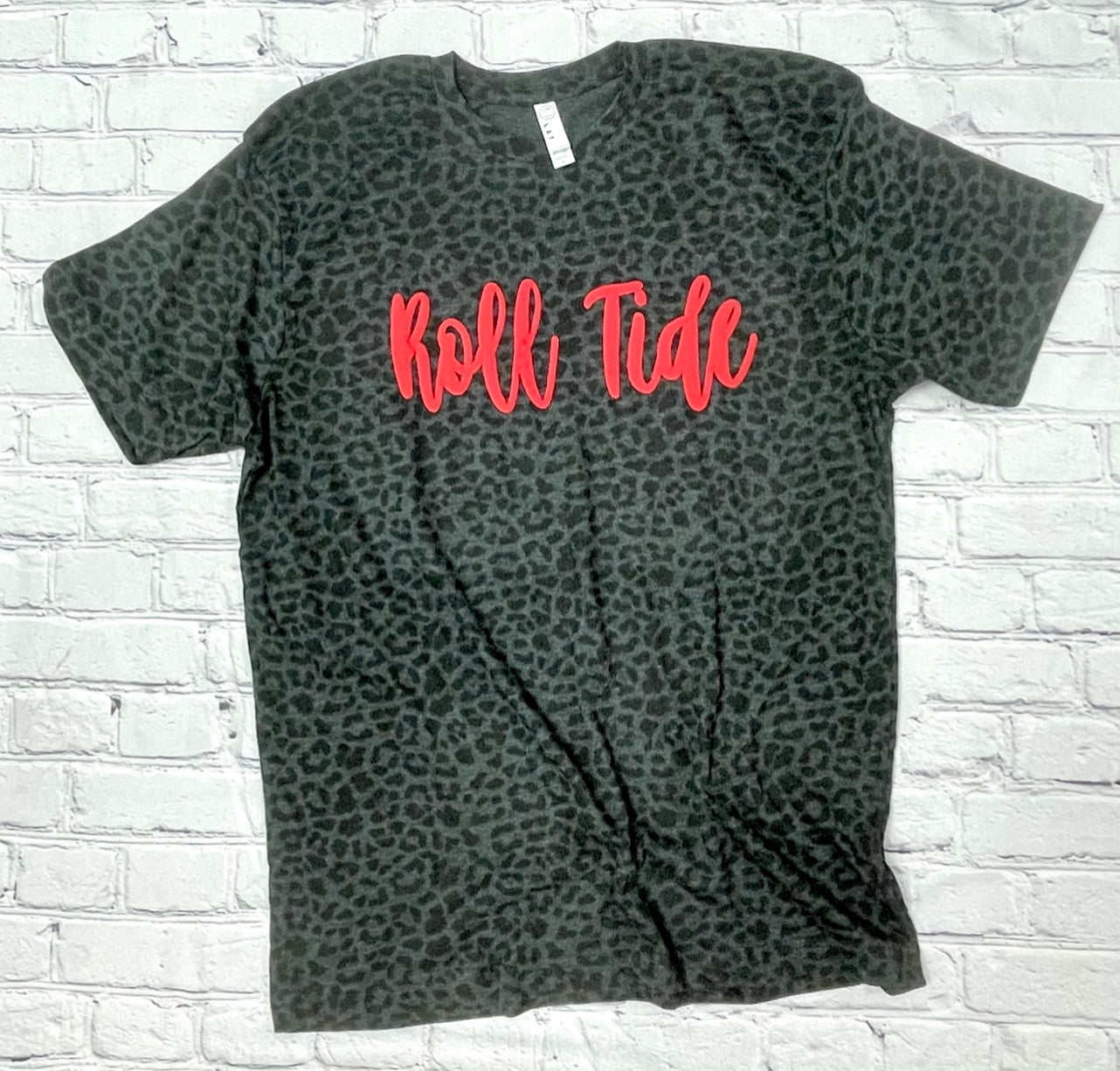 Roll Tide Puff letters on black cheetah shirt